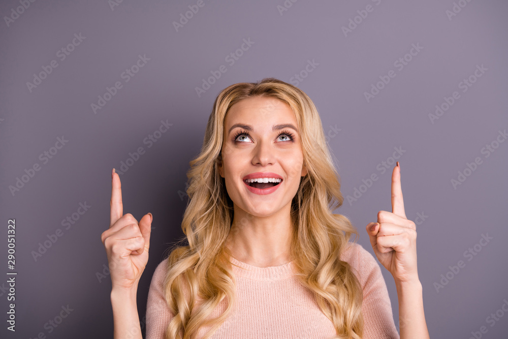 Close-up portrait of her she nice attractive lovely cheerful cheery content excited positive glad wavy-haired girl pointing two forefingers up isolated over gray violet purple pastel color background Close-up portrait of her she nice attractive lovely cheerful cheery content excited positive glad wavy-haired girl pointing two forefingers up isolated over gray violet purple pastel color background