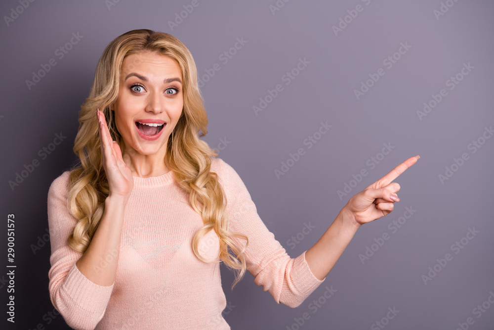 Portrait of her she nice attractive cheerful cheery glad positive excited wavy-haired girl pointing forefinger aside copy space advert ad isolated over gray violet purple pastel color background Portrait of her she nice attractive cheerful cheery glad positive excited wavy-haired girl pointing forefinger aside copy space advert ad isolated over gray violet purple pastel color background