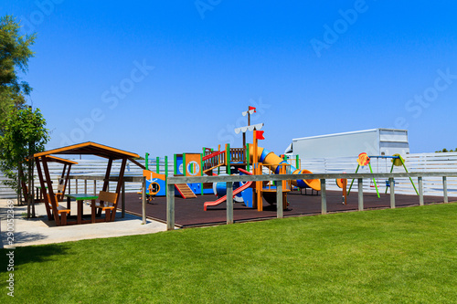 Children's wooden playground recreation area at public park