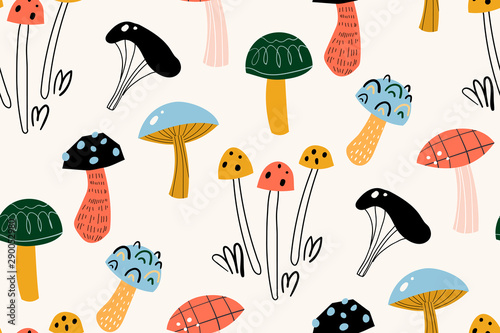 Seamless pattern with decorative mushrooms in the Scandinavian style. Perfect for kids fabric, textile, nursery wallpaper. Beautiful autumn illustration in vector.
