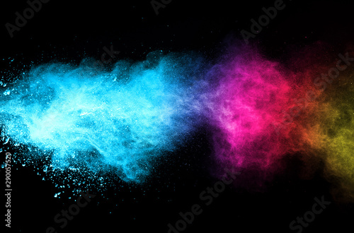 Explosion of colored powder isolated on black background. Abstract colored background. holi festival. © piyaphong