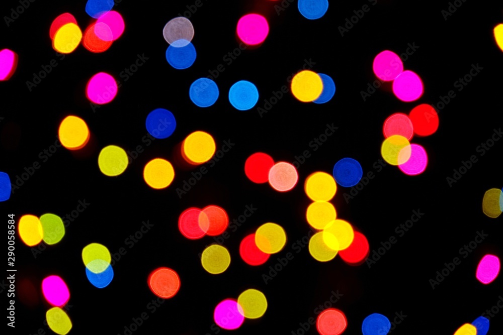 Bokeh lights background. Abstract multicolored light. Defocused fairy lights background. Christmas or New Year concept for background.