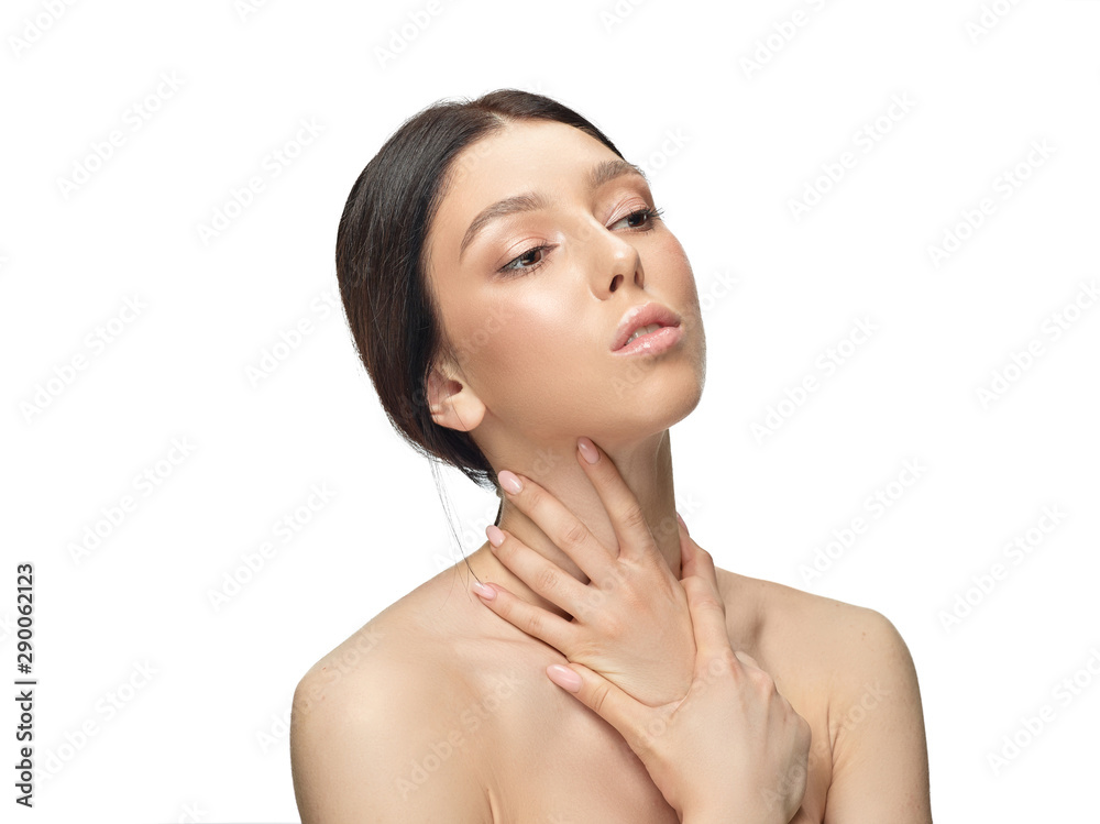 Portrait of beautiful young woman isolated on white studio background. Caucasian healthy female model looking at side, serious. Concept of women's health and beauty, self-care, body and skin care. Portrait of beautiful young woman isolated on white studio background. Caucasian healthy female model looking at side, serious. Concept of women's health and beauty, self-care, body and skin care.