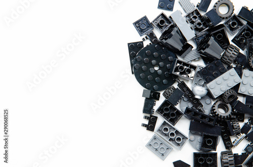Black Educational Toys Bricks Blocks Top View isolated on White Background © Prachana