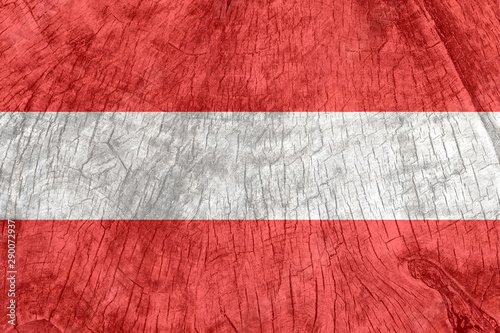 Austria flag on an old wooden surface.