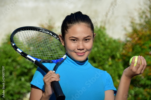 Sporty Diverse Female Tennis Player And Happiness With Tennis Racket © dtiberio