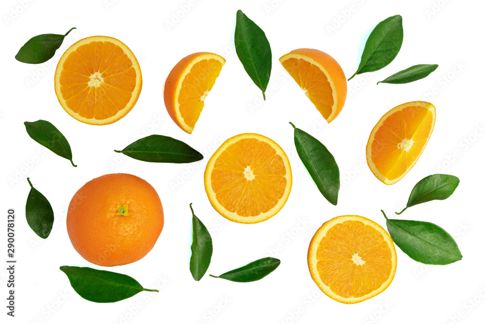 Top view of pattern orange fruit cut half and slice with green leaf isolated on white background with clipping path Top view of pattern orange fruit cut half and slice with green leaf isolated on white background with clipping path