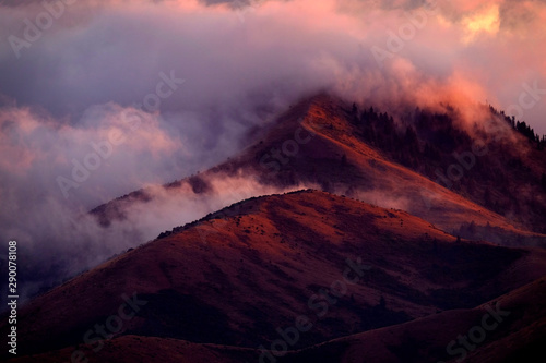 Mountain Wilderness with Clouds and Sunset Light