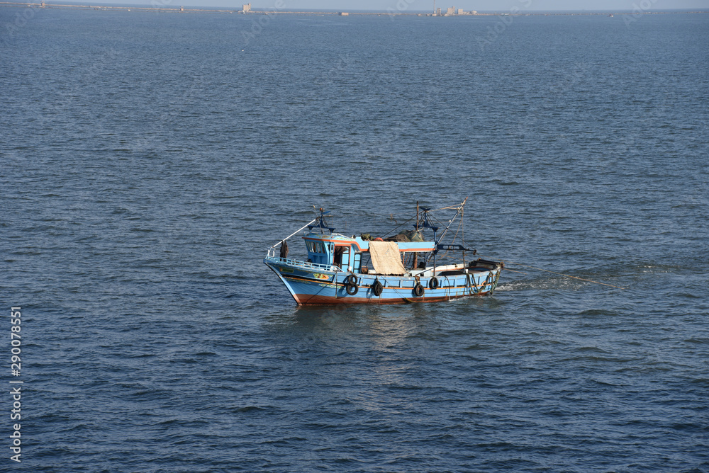 Fishing boat at sea near the Port Said, Egypt. 