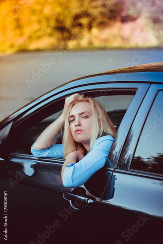 young woman in a car