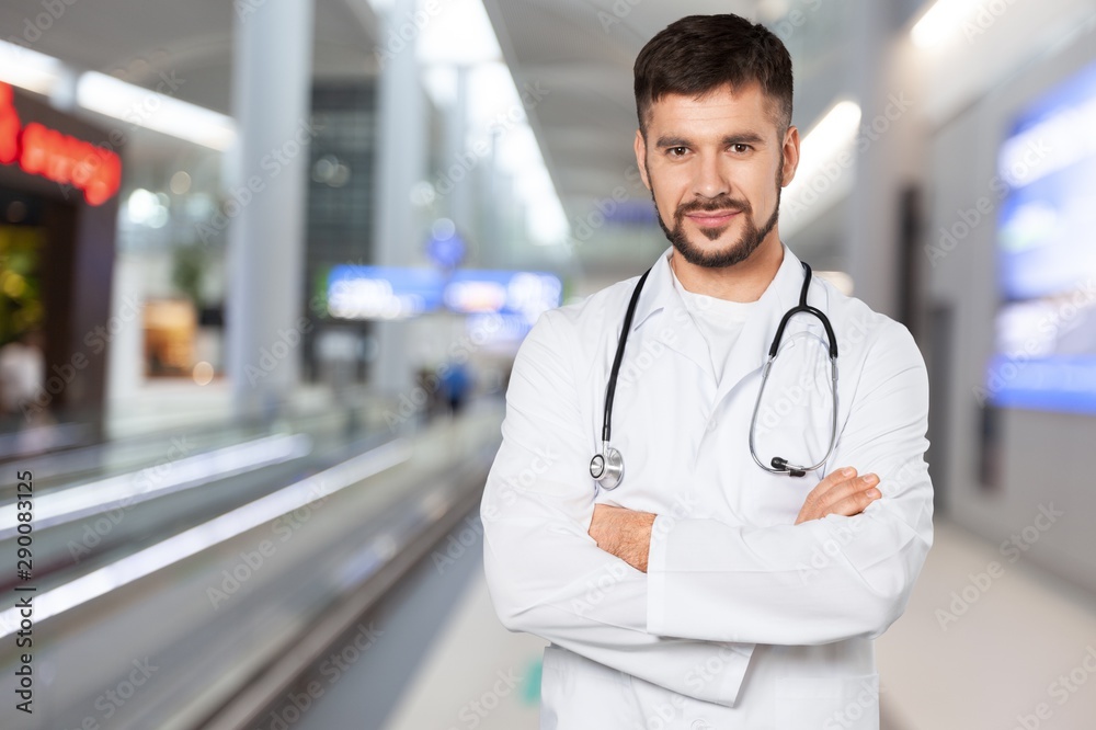 Young beautiful nurse on blurred hospital background Young beautiful nurse on blurred hospital background
