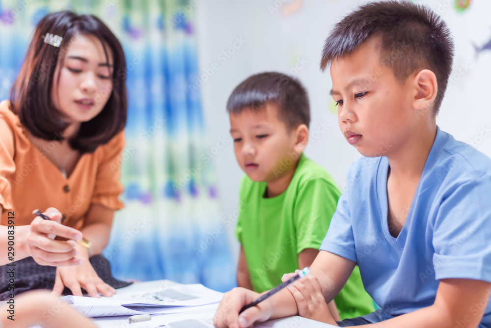 Asian elementary school boys are studying in the classroom. Asian elementary school boys are studying in the classroom.