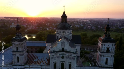 Medieval Catholic ancient castle-fortress in Berdichiv city, Ukraine. Monastery of the Barefoot Carmelites. Aerial survey, flight of drone photo