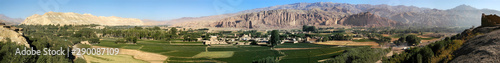Very large panorama (49MP) of Bamyan (Bamiyan) in Central Afghanistan. This is a view over the Bamyan (Bamiyan) Valley showing both Buddha niches in the cliff. UNESCO site: Afghanistan Buddhas. photo
