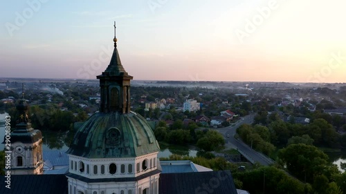 Medieval Catholic ancient castle-fortress in Berdichiv city, Ukraine. Monastery of the Barefoot Carmelites. Aerial survey, flight of drone photo