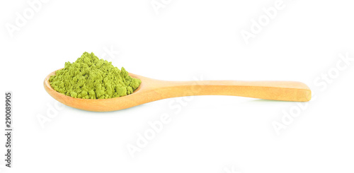 powdered matcha green tea in wooden spoon isolated on white background