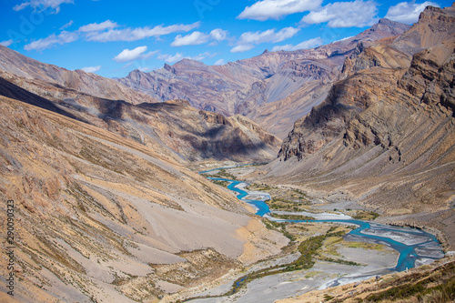 Himalayan mountain landscape along Leh to Manali highway. Blue river and rocky mountains in Indian Himalayas, India