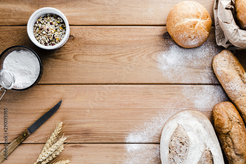 Flat lay of bread on wooden background