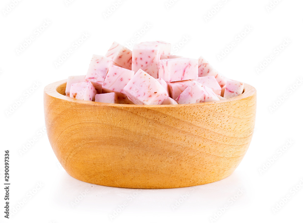 taro roots in wooden bowl on white background taro roots in wooden bowl on white background