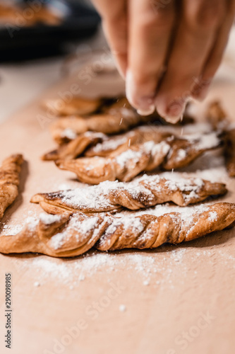 Mom bakes sweet cookies at home to pamper her children