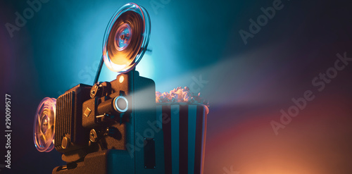Foto Vintage film projector and film screening