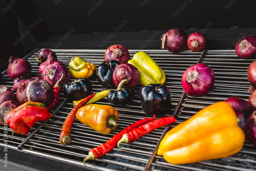 Bright juicy ripe grilled vegetables - grilled onions, peppers, eggplant on coals