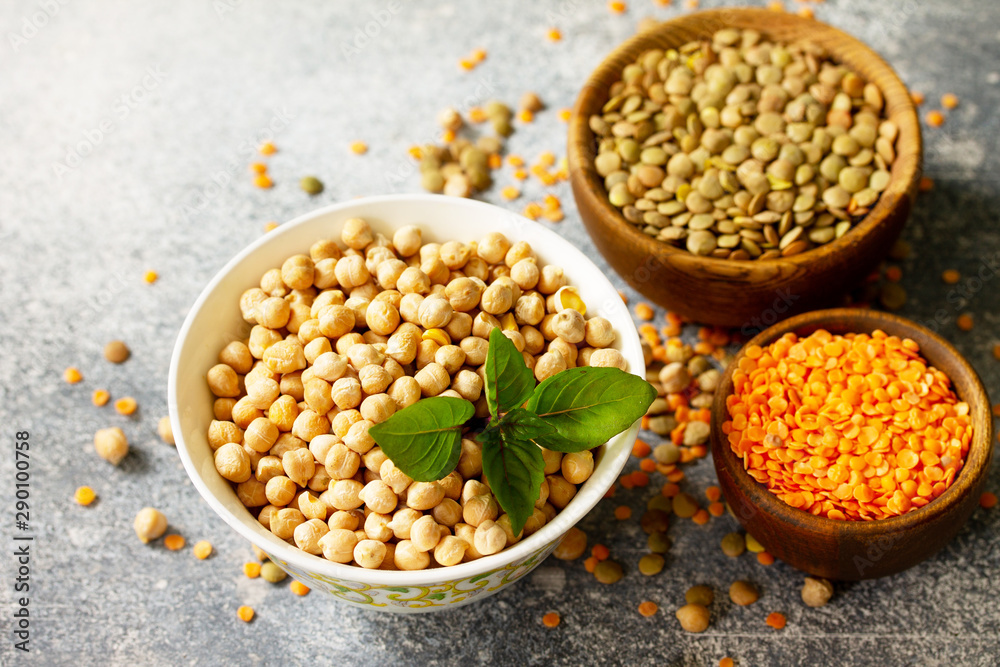 Healthy food, dieting, concept vegan protein source. Raw of legumes (chickpeas, red lentils, canadian lentils). Healthy food, dieting, concept vegan protein source. Raw of legumes (chickpeas, red lentils, canadian lentils).