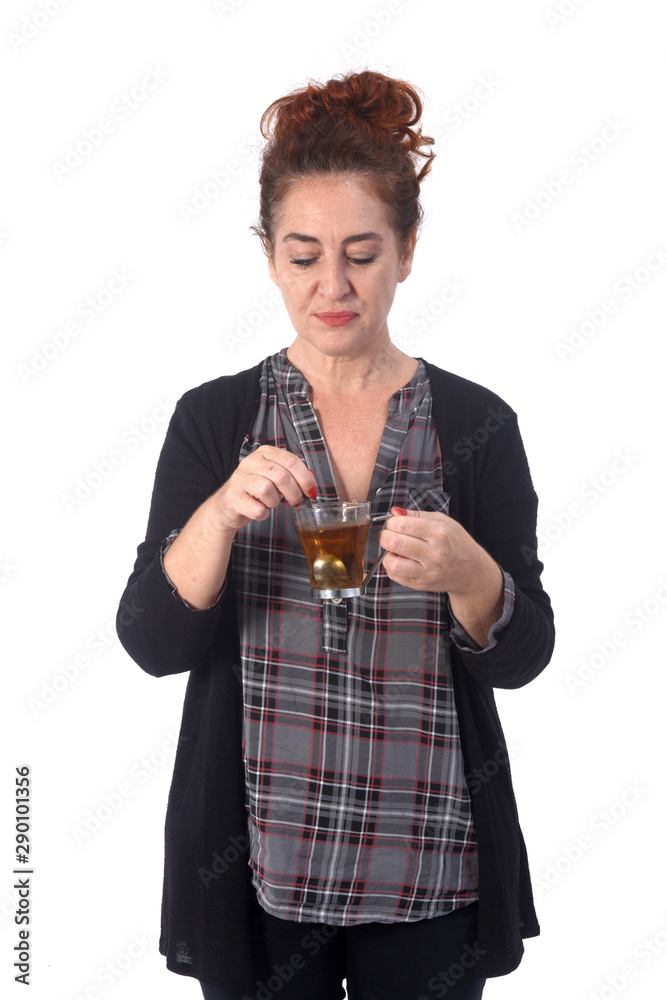 woman with a cup of infusion on white background woman with a cup of infusion on white background