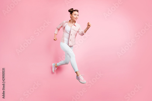 Full length body size view portrait of her she nice-looking attractive charming lovely focused strong sportive cheerful cheery girl running fast marathon isolated on pink pastel background