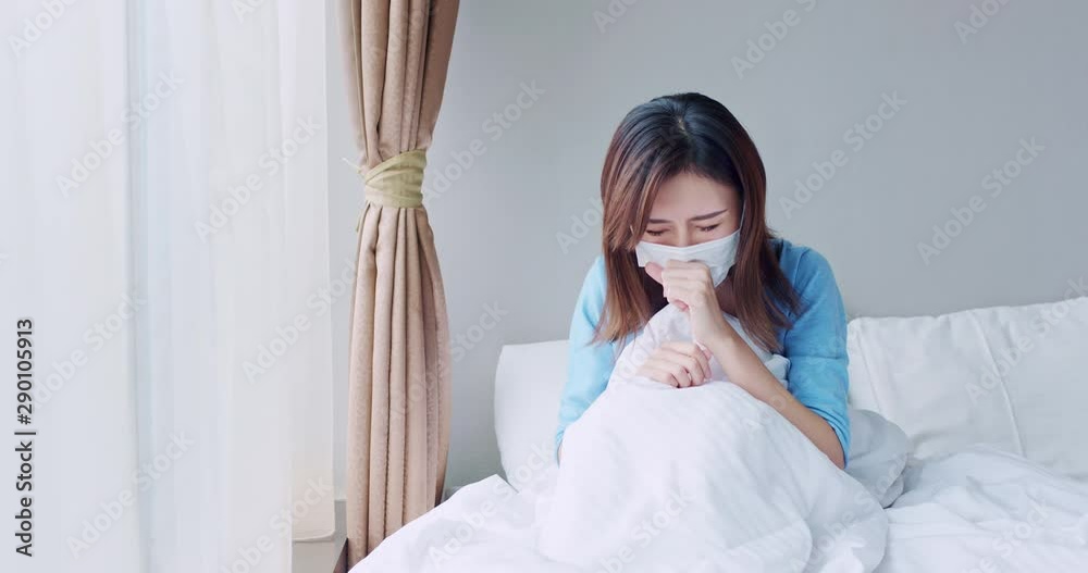 asian woman cough in bedroom asian woman cough in bedroom