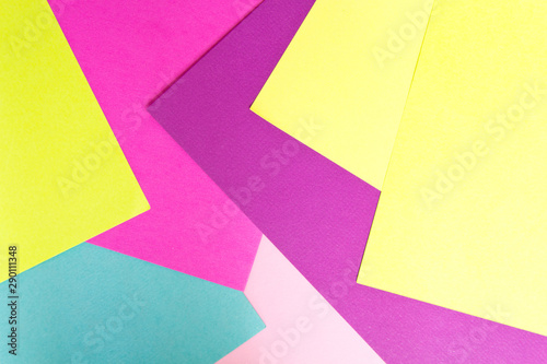 Geometric colored cardboard background. Copy space for advertising and texts