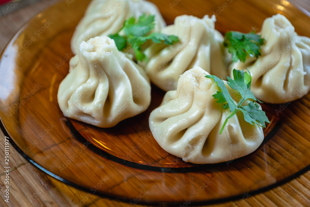 Khinkali - traditional Georgian dumpling dish - popular in the country of Georgia Khinkali - traditional Georgian dumpling dish - popular in the country of Georgia