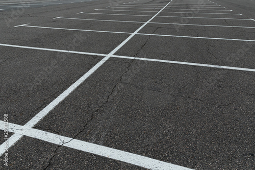 Parking places on gray ashalt road surface.