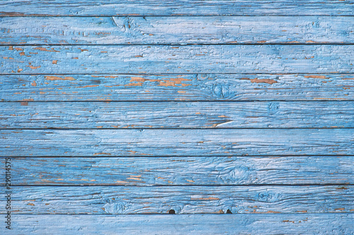 Old wooden fence painted in blue.