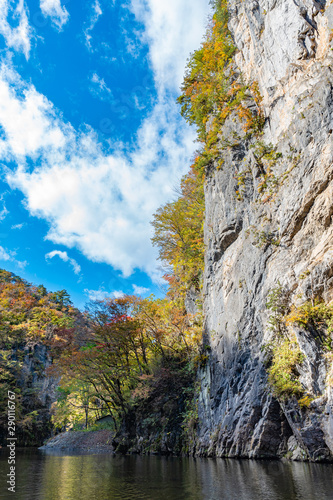 Geibi Gorge ( Geibikei ) Autumn foliage scenery view in sunny day. Beautiful landscapes of magnificent fall colours in Ichinoseki, Iwate Prefecture, Japan photo