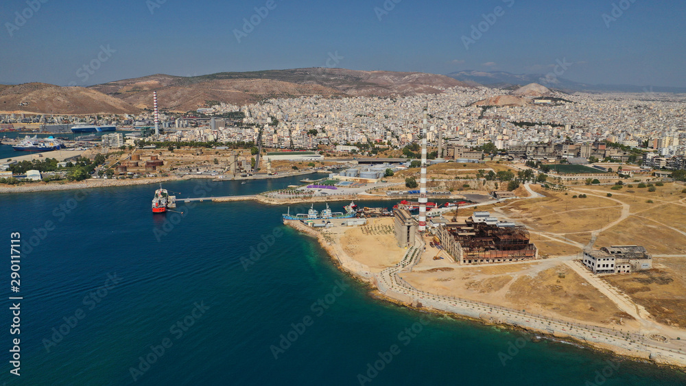 Aerial drone panoramic photo of busy port of Piraeus, the largest in Greece and one of the largest passenger ports in Europe, Attica, Greece 