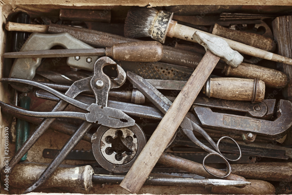 Box with the different old hand tools Box with the different old hand tools