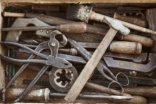 Box with the different old hand tools
