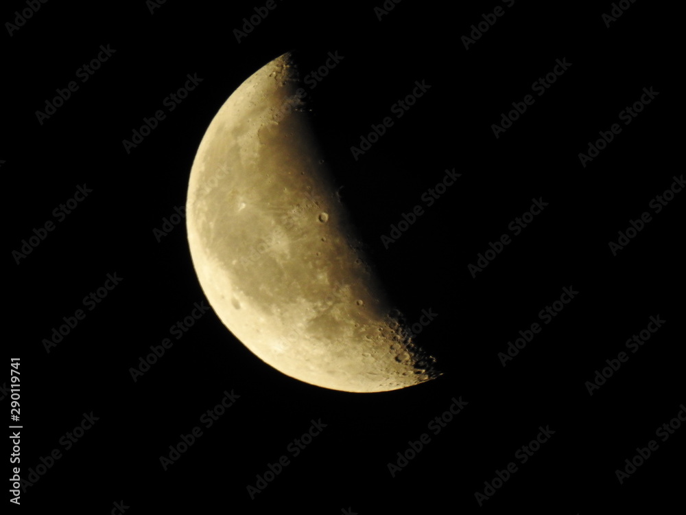 moon on the wane ochre colored on black sky moon on the wane ochre colored on black sky