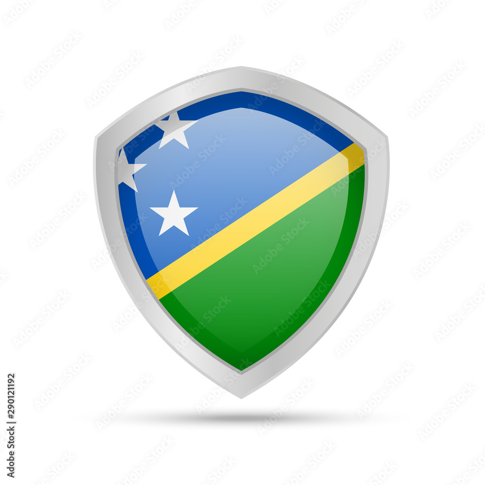 Fototapeta premium Shield with Solomon Islands flag on white background.