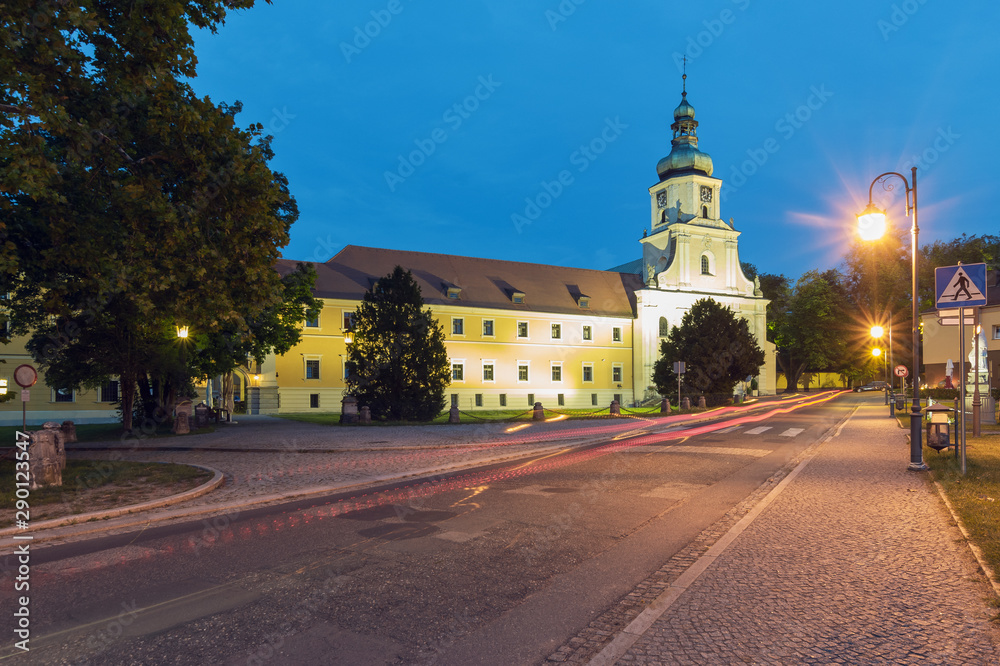 monastery and palace complex in Poland in the evening.