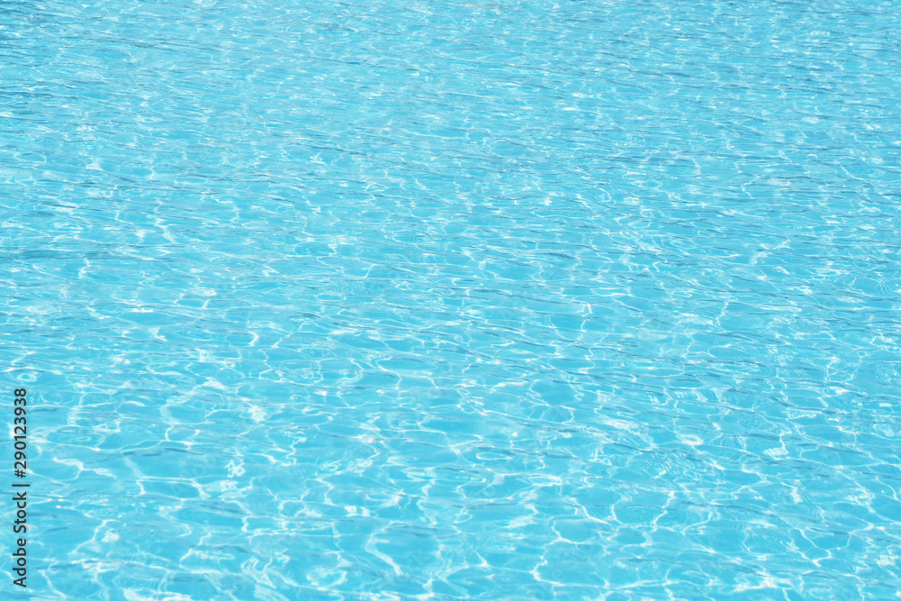 Abstract background of pool water with small waves.