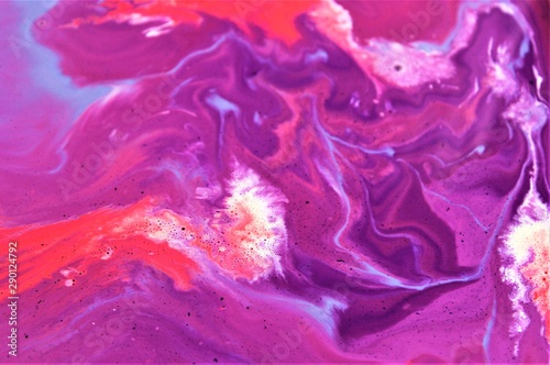 Pink and lilac abstract background with mixed paint. Acrylic texture with marble pattern. Wallpaper. Color mixing. Contemporary art, design, fashion.