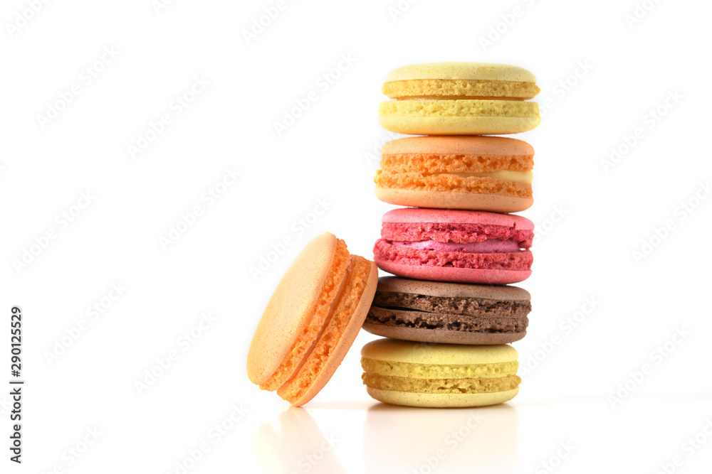Fototapeta premium Set of colorful macaroons on isolated white background. Fresh multicolor macaroons.