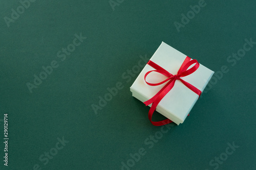 Isolated gift box on green background