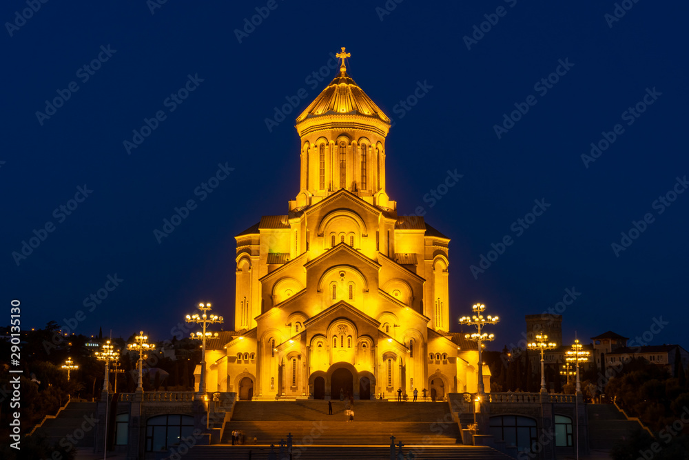 Famous Orthodox Holy Trinitiy Sameba church illuminated with golden light.