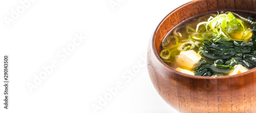 Miso soup japanese traditional meal in wooden bowl isolated on white background