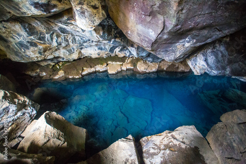 Blue crystal water cave in Myvatn famous for a game of thrones scene, Iceland