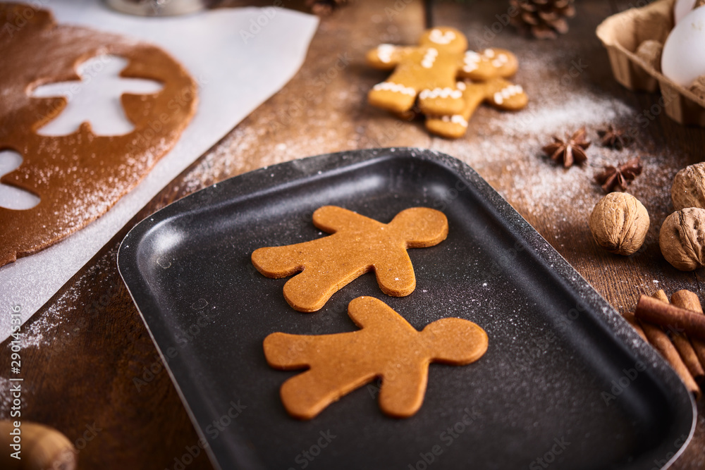 Christmas background. Christmas preparation, kitchen table with dought for cooking Christmas background. Christmas preparation, kitchen table with dought for cooking