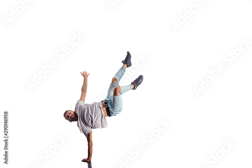 Young man doing one handstand